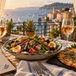 Restaurant typique côte d azur : salade niçoise et socca sur terrasse vue mer